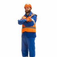 Handsome builder isolated on white studio background